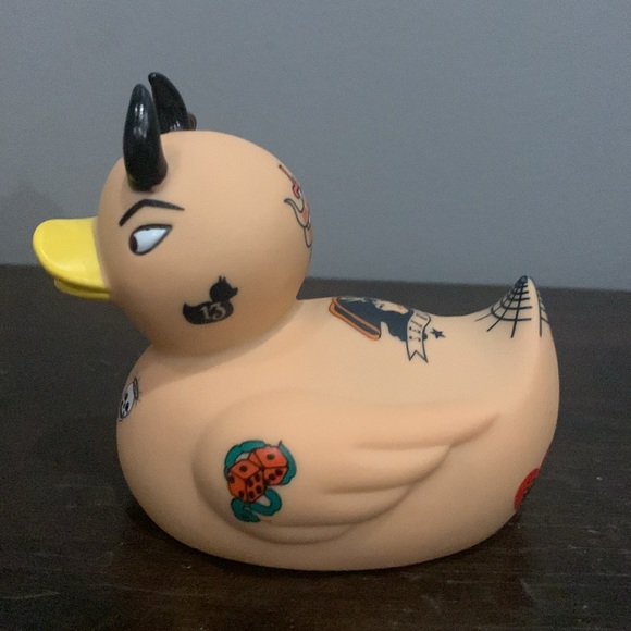 A collection of rubber ducks. - Picture 6 of 8